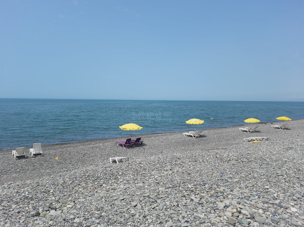 Pebble beach on the Black Sea coast near Batumi with clear turquoise water